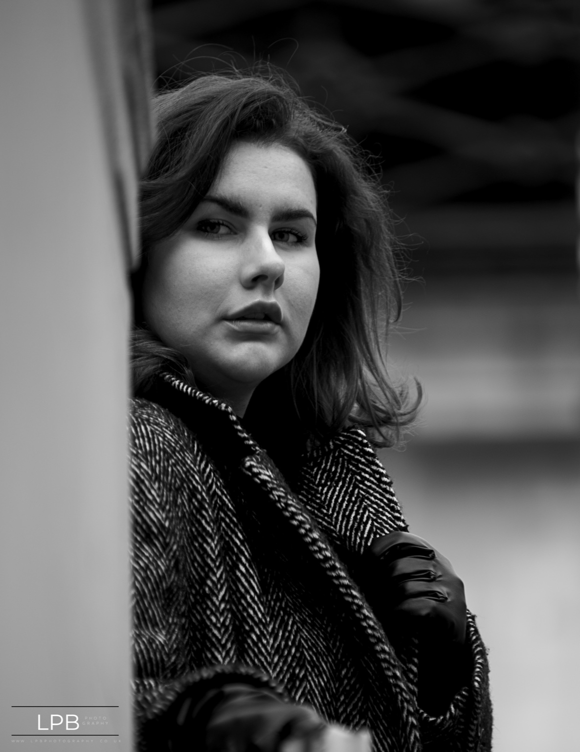 Black and white portrait of a subject in soft directional light