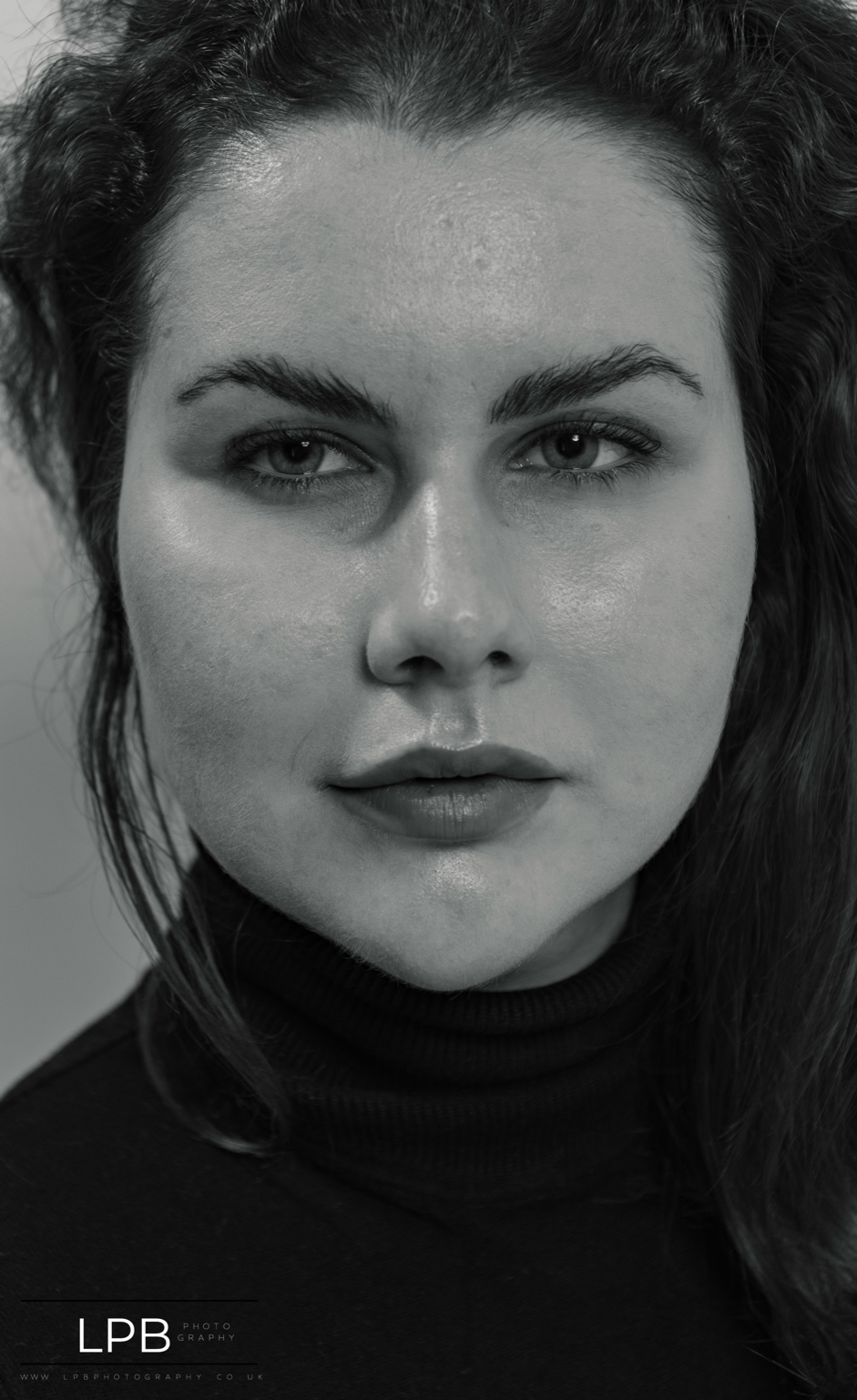 Black and white portrait emphasizing expression and stillness