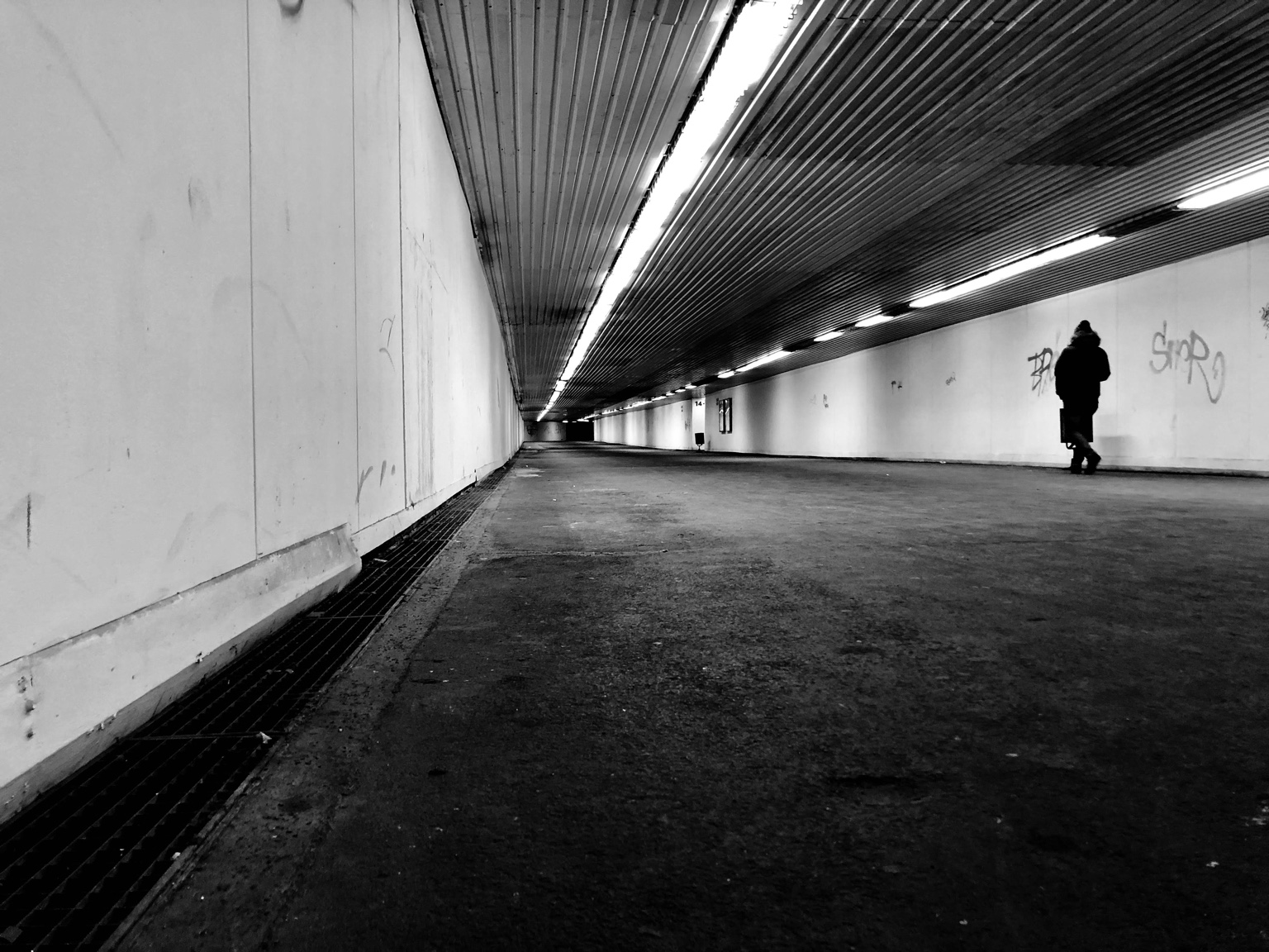 Black and white fine art photograph exploring distance and isolation