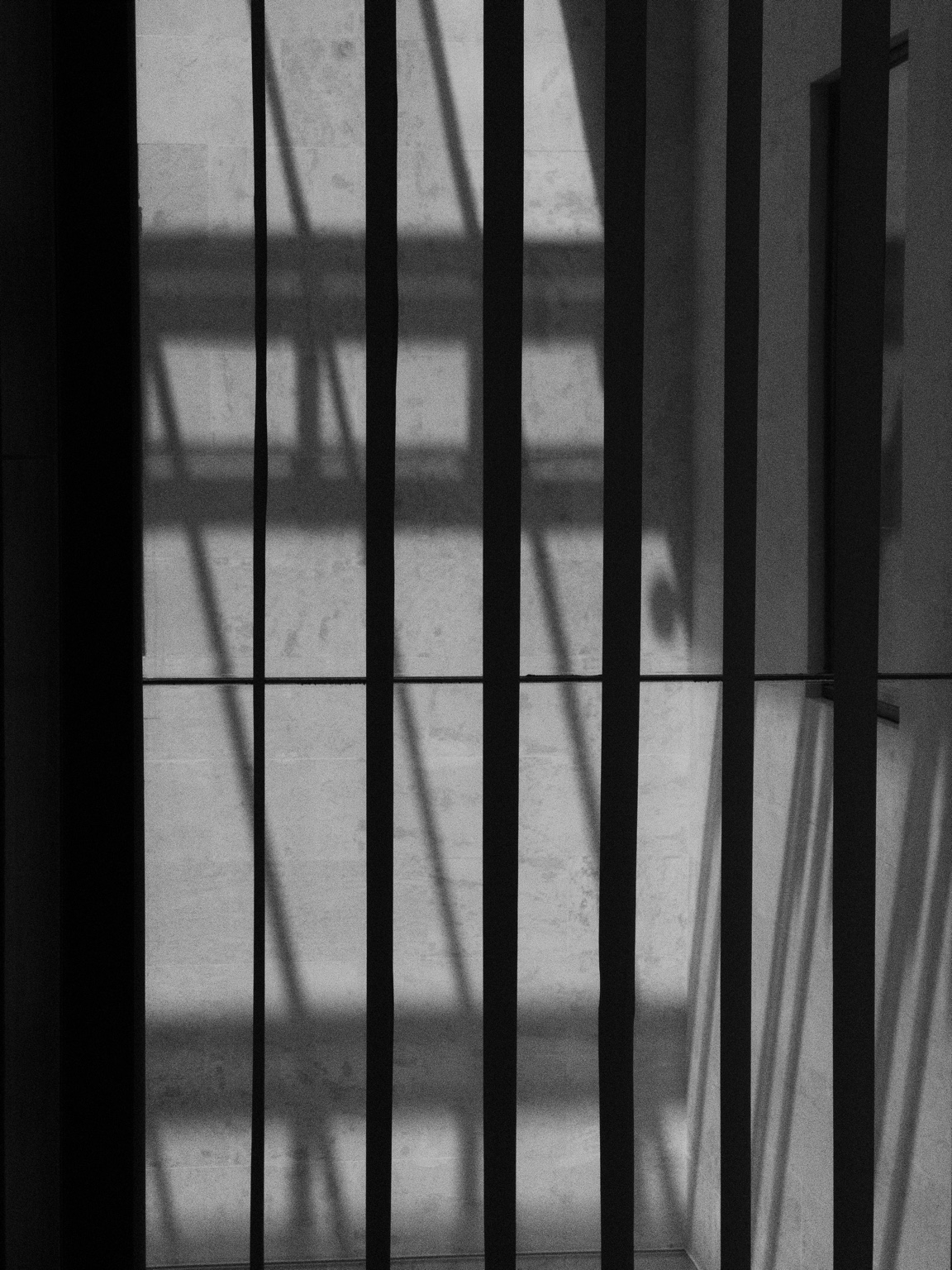 Black and white architectural photograph focused on structure and form